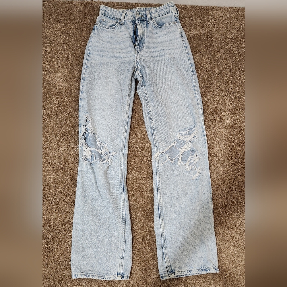 Ripped high waisted wide-legged jeans